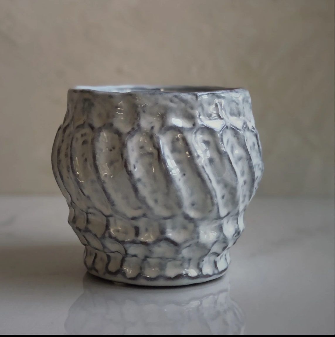 EMBOSSED STONEWARE VASE